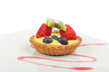 Tart with blueberries, kiwi , strawberries and custard