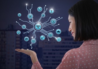 Businesswoman with hands palm open and various business icons