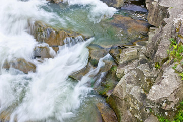 The waterfall  Probyu on the mountain river Prut in the Ukrainian Carpathians