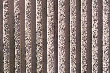Brown tinted corrugated concrete wall