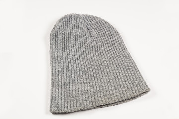 Grey knitted hat on a white background