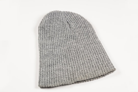 Grey Knitted Hat On A White Background