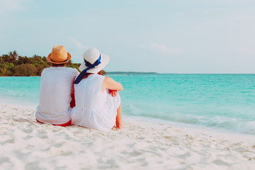 happy loving couple on tropical beach