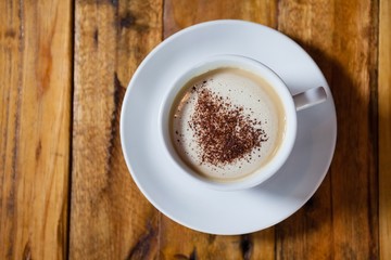 Coffee cup on wooden table