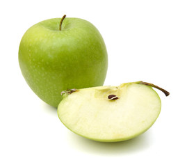 Green apple and it's slice isolated on white