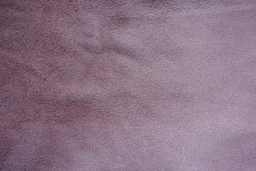 Dusty rose artificial suede fabric surface from above
