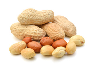 Dried peanuts in closeup on white background