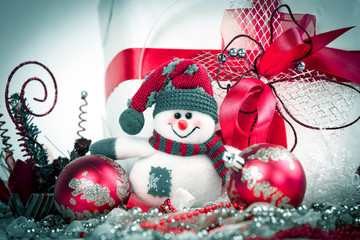 closeup.cute toy snowman and various Christmas decorations