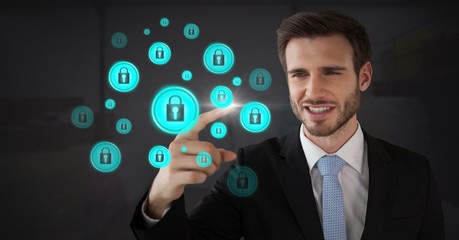 Obraz premium Businessman touching security lock icons connecting on map