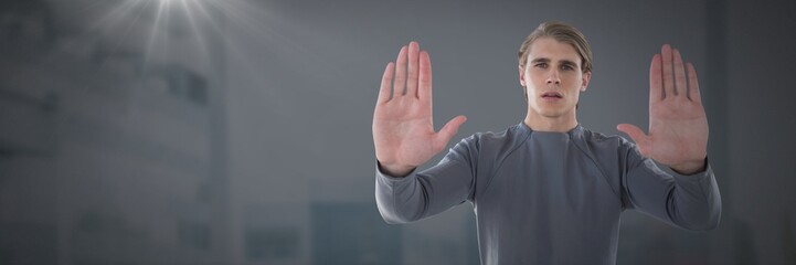 Obraz premium Businessman holding hands up