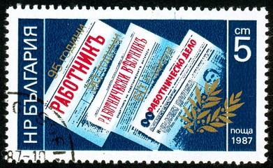 UKRAINE - circa 2017: A postage stamp printed in Bulgaria shows Newspapers, Series Press release anniversaries, circa 1987