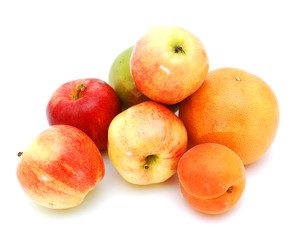 fresh red apples and plum,  pomelo isolated on white background