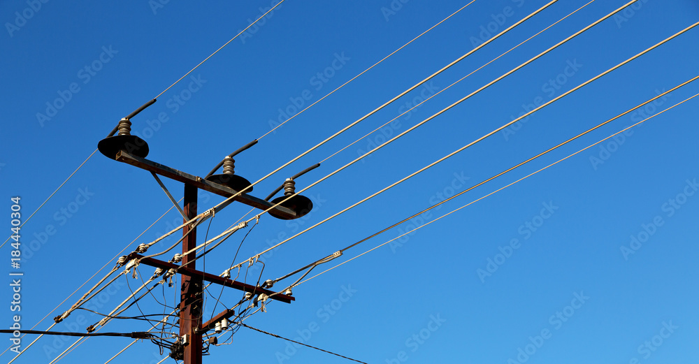 Wall mural power line with electrical pole in the clear sky