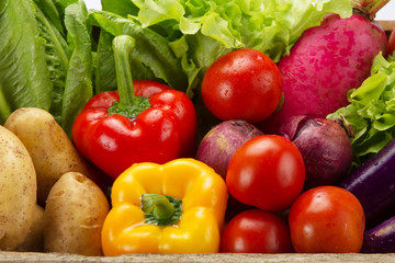 Assortment of fresh vegetables in basket for healthy eating, grocery, supermarket concept. 