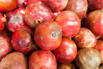 Milan, Italy - December 6, 2017: Basket of pomegranates
