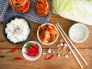 Kimchi,fermented cabbage traditional Korean food on wooden table in top view.
