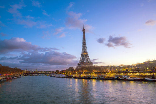 The Eiffel Tower and river Seine at twilight in Paris