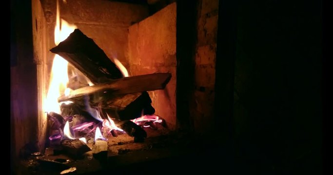 Firewood burns in a firebox