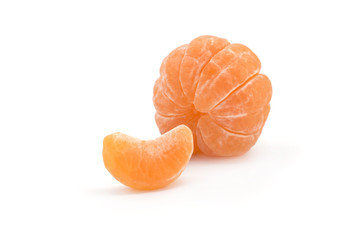 Peeled orange slices mandarin isolated on white background