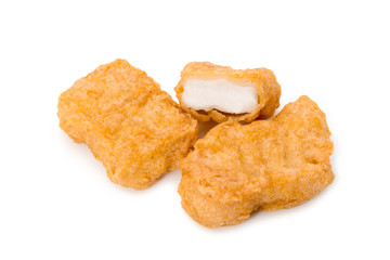 Fried chicken nuggets isolated on white background.