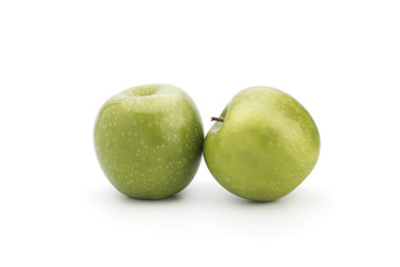 Green apples on a white background