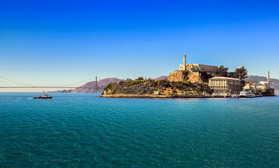 San Francisco bay with Alcatraz Island  and Golden Gate Bridge  on sunny day