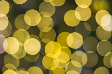 bokeh or defocused of decoration lighting on pine tree for merry christmas and happy new year.