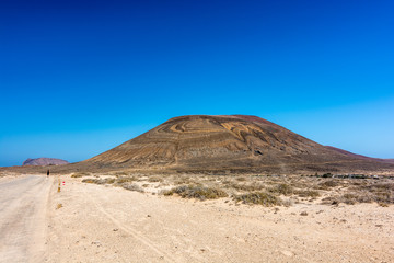 tattooed volcano in La Graciosa. Canary island. Desert landscape