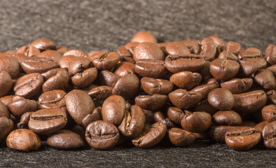 texture of coffee, with beautiful patches of light on the surface of grains