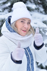  woman in winter clothes posing 