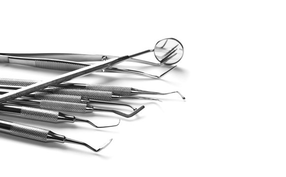 Set of medical equipment tools for teeth dental care isolated on white