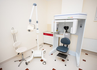Dental X-ray unit and panoramic radiography machine in a dental office