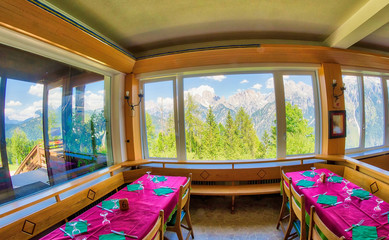 Hut on the Alps. View of mountains from the interior