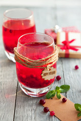 two berry drink with spices for cold winter and gifts for holiday
