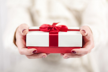 Present box in woman's hands