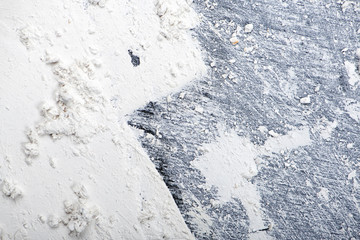 Abstract background of plaster on black wall. Copy space.