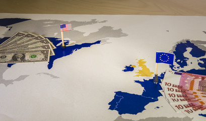 Map of america and EU, bills and flags.
