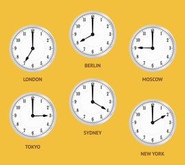 Wall clocks showing local times. World time zones. Clocks displaying time in big cities.