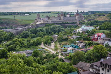 Naklejka premium Aerial view of Kamianets Podilskyi city with a castle on background, Ukraine