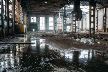Abandoned industrial creepy warehouse, old dark grunge factory building
