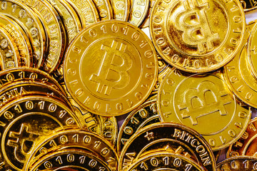 Pile of gold bitcoins in cyrptocurrency theme