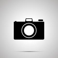 Photo camera silhouette, simple black icon