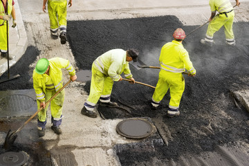 highway maintenance workers in construction site