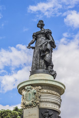 Fototapeta na wymiar Statue of Reina Maria Cristina de Borbon, dedicated to Queen Maria Cristina de Borbon, fourth wife of Fernando VII and mother of Isabel II, near entrance to Prado Museum in Madrid, Spain, Europe.