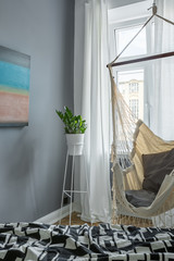 Bedroom with indoor hammock