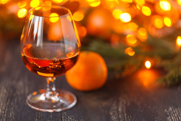 christmas composition with oranges and fir tree, on wooden background