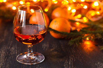 Happy christmas or new year card. New Year or Christmas decorations with mandarins and christmas lights