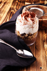 dessert tiramisu in glasses, concept of delicious life
