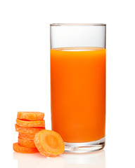 Glass of carrot juice and fresh carrots isolated on white