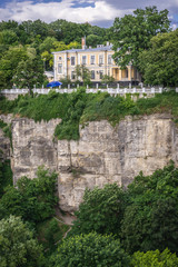 Fototapeta na wymiar Rock wall of Smotrych River canyon in Kamianets Podilskyi, Ukraine